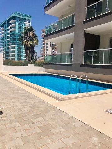 Двухкомнатная квартира в Махмутларе по выгодной цене