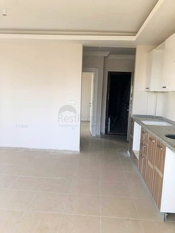 Двухкомнатная квартира в Махмутларе по выгодной цене