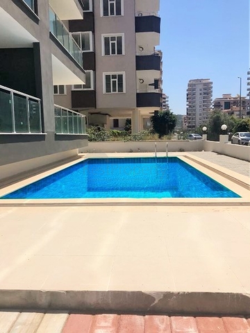 Двухкомнатная квартира в Махмутларе по выгодной цене