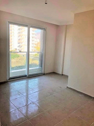 Двухкомнатная квартира в Махмутларе по выгодной цене