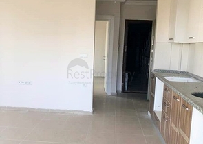 Двухкомнатная квартира в Махмутларе по выгодной цене