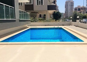 Двухкомнатная квартира в Махмутларе по выгодной цене