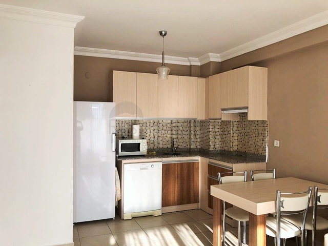 Меблированная квартира 1+1 в районе Махмутлар