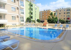 Меблированная квартира 1+1 в районе Махмутлар