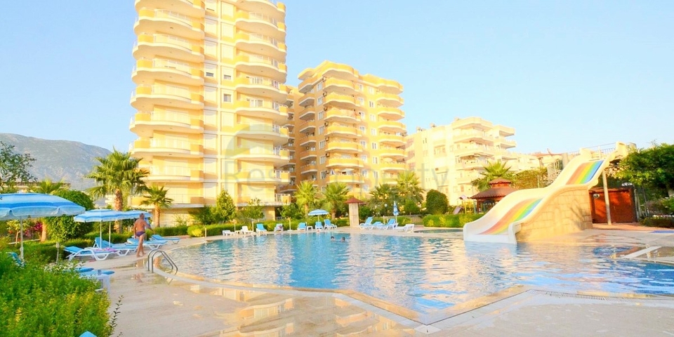 Квартира планировки 2+1 на первой береговой линии в Махмутларе