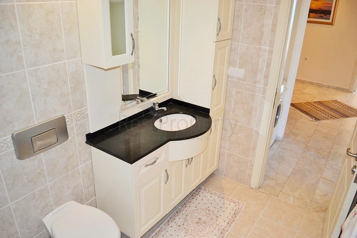 Квартира планировки 2+1 на первой береговой линии в Махмутларе