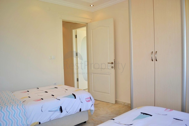 Квартира планировки 2+1 на первой береговой линии в Махмутларе