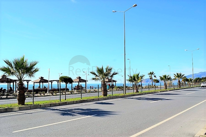 Квартира планировки 2+1 на первой береговой линии в Махмутларе