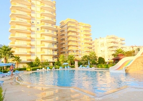 Квартира планировки 2+1 на первой береговой линии в Махмутларе