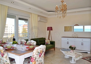 Квартира планировки 2+1 на первой береговой линии в Махмутларе