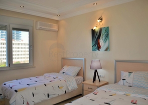 Квартира планировки 2+1 на первой береговой линии в Махмутларе