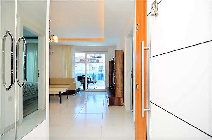 Меблированная квартира 1+1 в районе Махмутлар