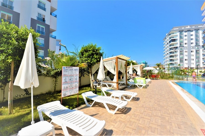 Меблированная квартира 1+1 в районе Махмутлар