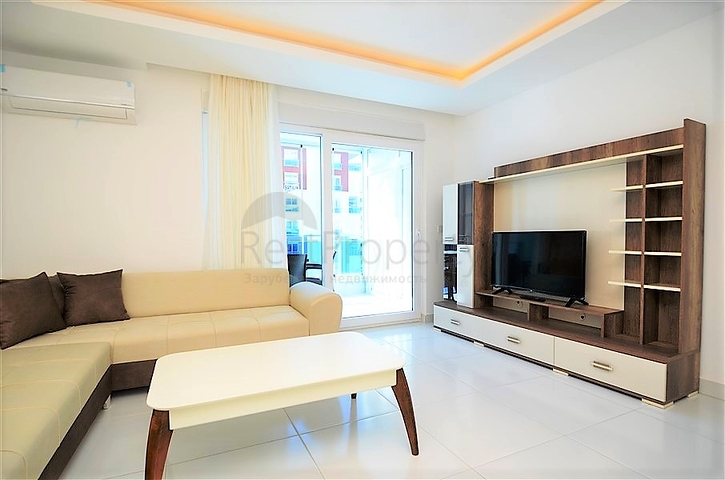 Меблированная квартира 1+1 в районе Махмутлар