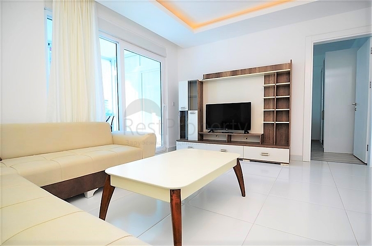 Меблированная квартира 1+1 в районе Махмутлар