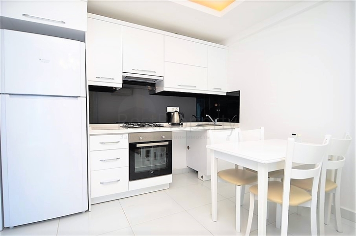 Меблированная квартира 1+1 в районе Махмутлар