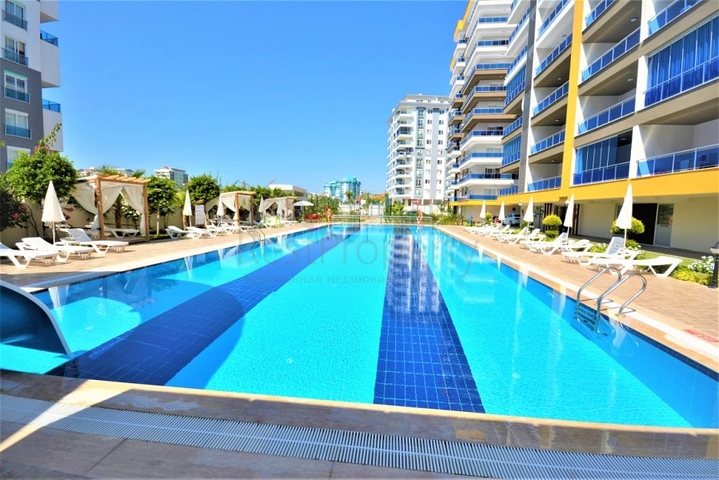 Меблированная квартира 1+1 в районе Махмутлар