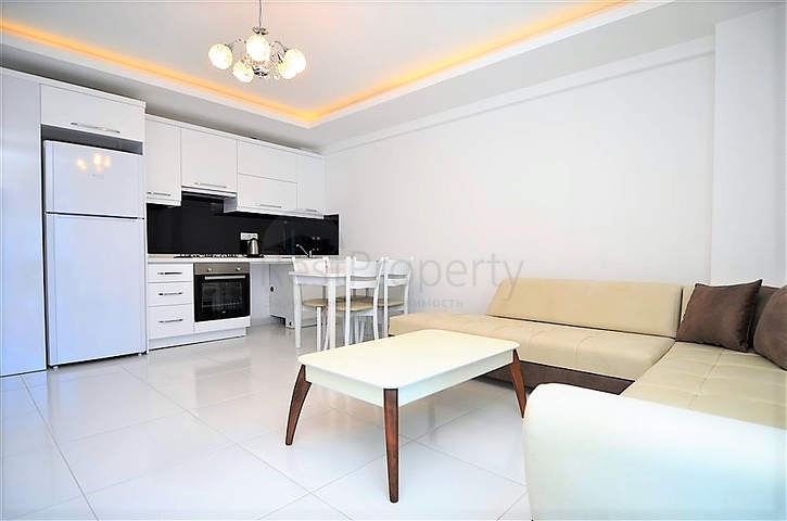 Меблированная квартира 1+1 в районе Махмутлар