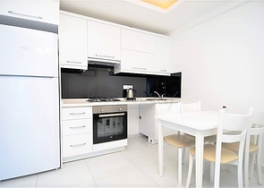 Меблированная квартира 1+1 в районе Махмутлар