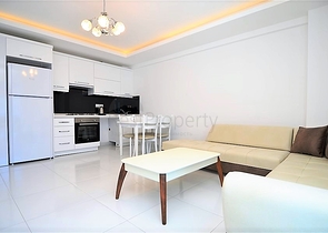 Меблированная квартира 1+1 в районе Махмутлар