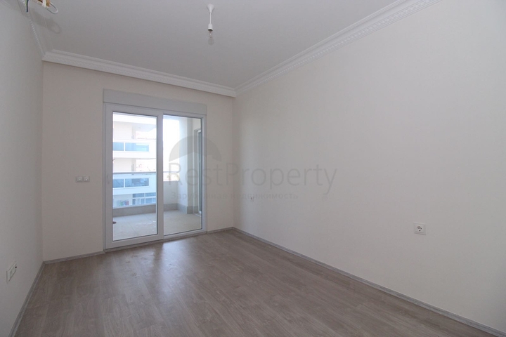 Трехкомнатная квартира в районе Махмутлар