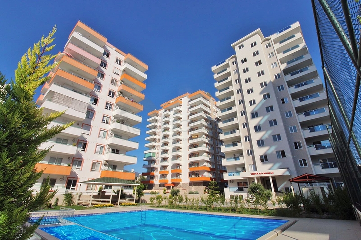 Трехкомнатная квартира в районе Махмутлар