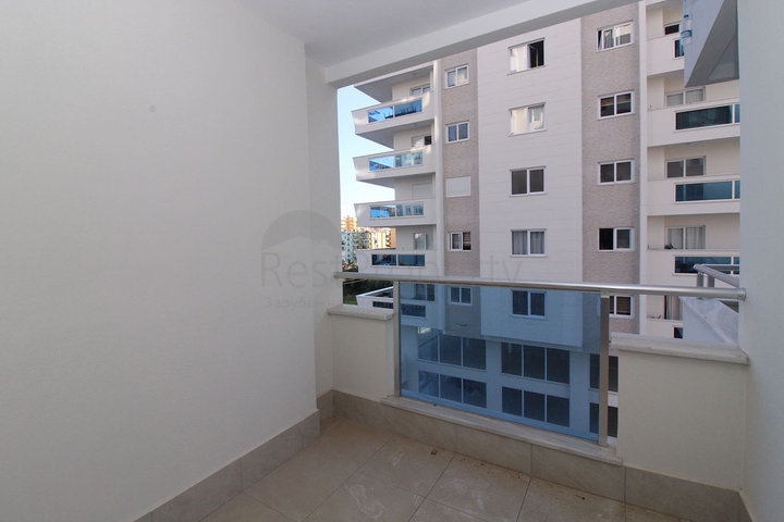 Трехкомнатная квартира в районе Махмутлар