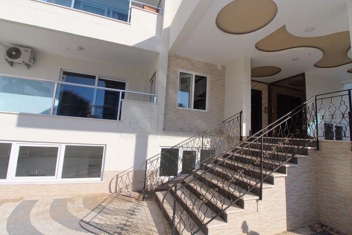 Трехкомнатная квартира в районе Махмутлар