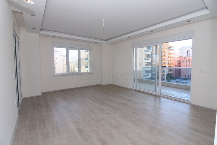 Трехкомнатная квартира в районе Махмутлар