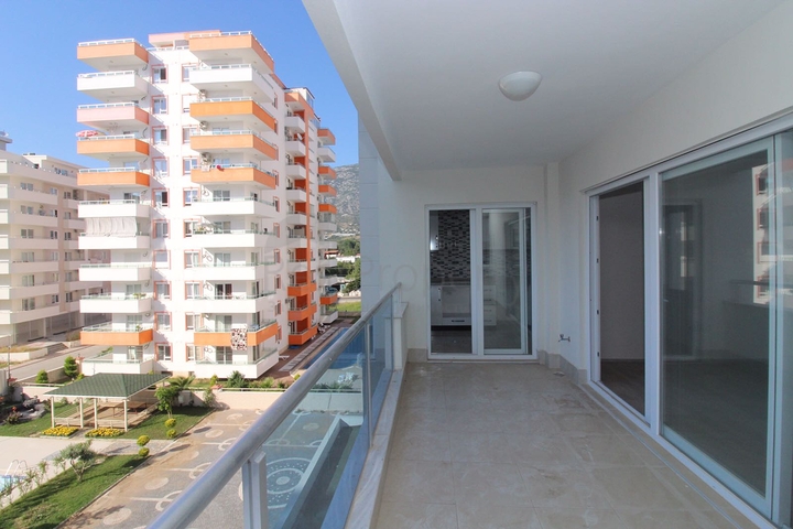 Трехкомнатная квартира в районе Махмутлар