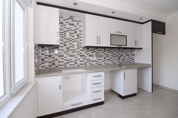 Трехкомнатная квартира в районе Махмутлар