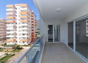 Трехкомнатная квартира в районе Махмутлар