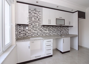 Трехкомнатная квартира в районе Махмутлар