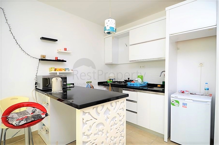 Трехкомнатная квартира в современном комплексе Махмутлара