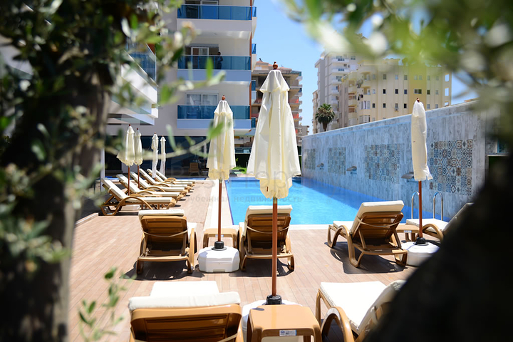 Трехкомнатная квартира в современном комплексе Махмутлара