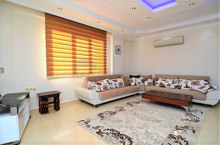 Большая двухуровневая квартира с видом на море в Махмутларе