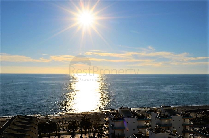 Большая двухуровневая квартира с видом на море в Махмутларе
