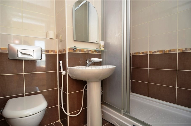 Большая двухуровневая квартира с видом на море в Махмутларе