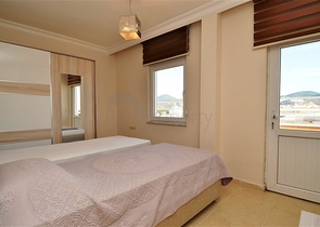 Большая двухуровневая квартира с видом на море в Махмутларе