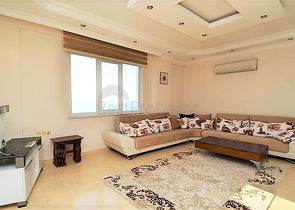 Большая двухуровневая квартира с видом на море в Махмутларе