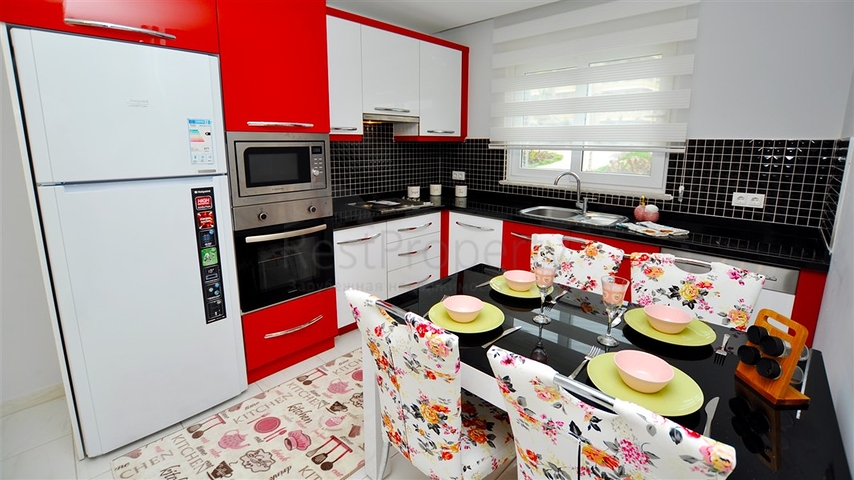 Меблированная квартира планировки 1+1 в районе Махмутлар