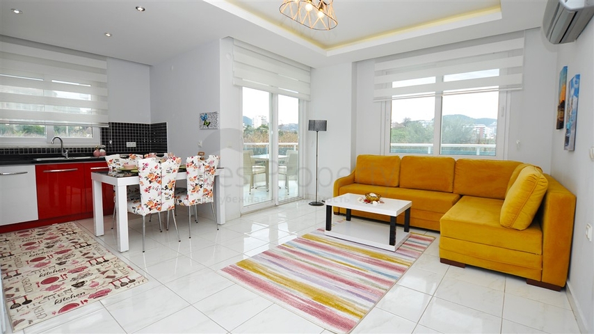 Меблированная квартира планировки 1+1 в районе Махмутлар