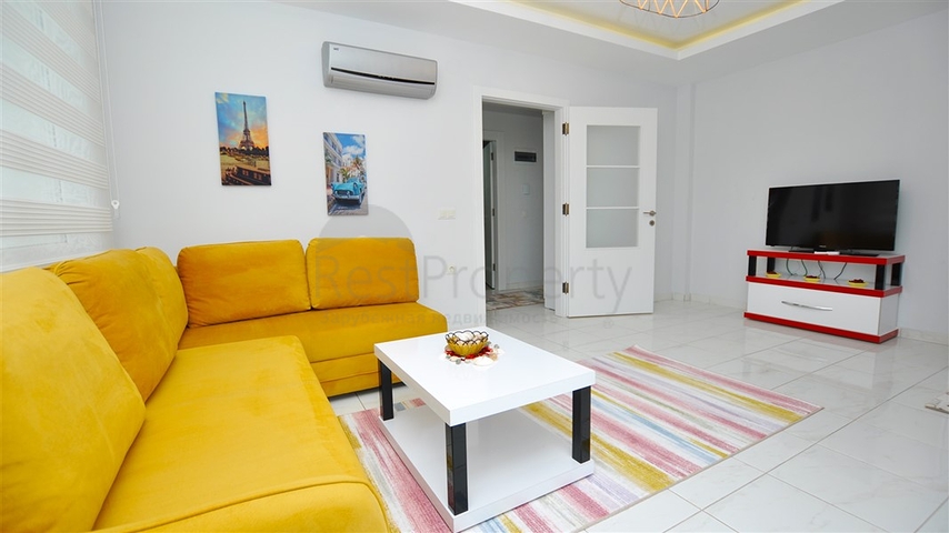 Меблированная квартира планировки 1+1 в районе Махмутлар