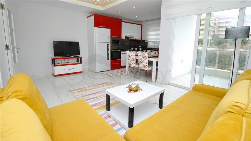 Меблированная квартира планировки 1+1 в районе Махмутлар