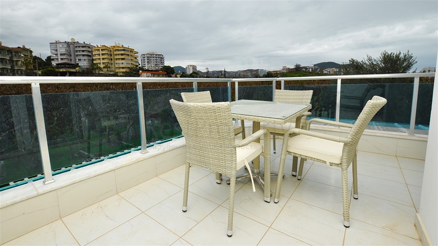 Меблированная квартира планировки 1+1 в районе Махмутлар