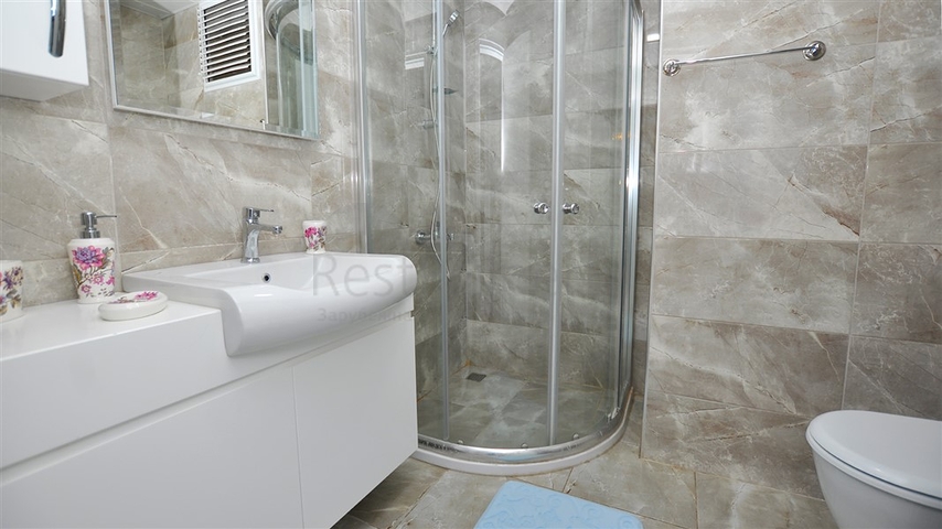 Меблированная квартира планировки 1+1 в районе Махмутлар