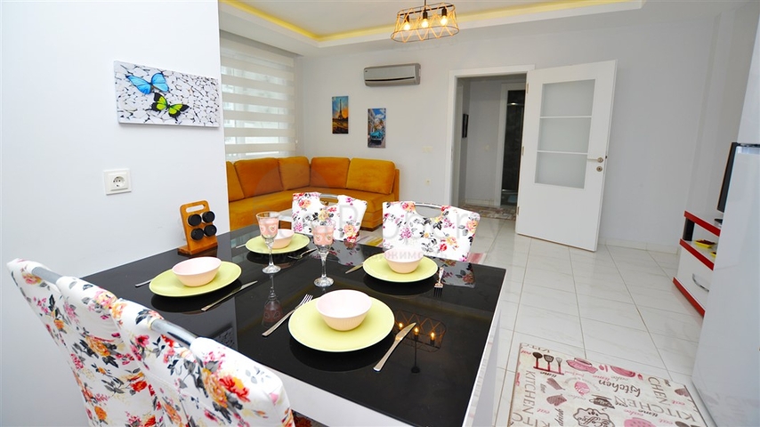 Меблированная квартира планировки 1+1 в районе Махмутлар