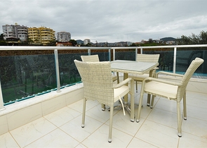 Меблированная квартира планировки 1+1 в районе Махмутлар