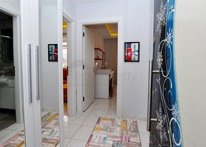 Меблированная квартира планировки 1+1 в районе Махмутлар