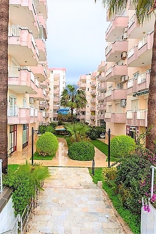 Квартира 2+1 на первой береговой линии в Махмутларе